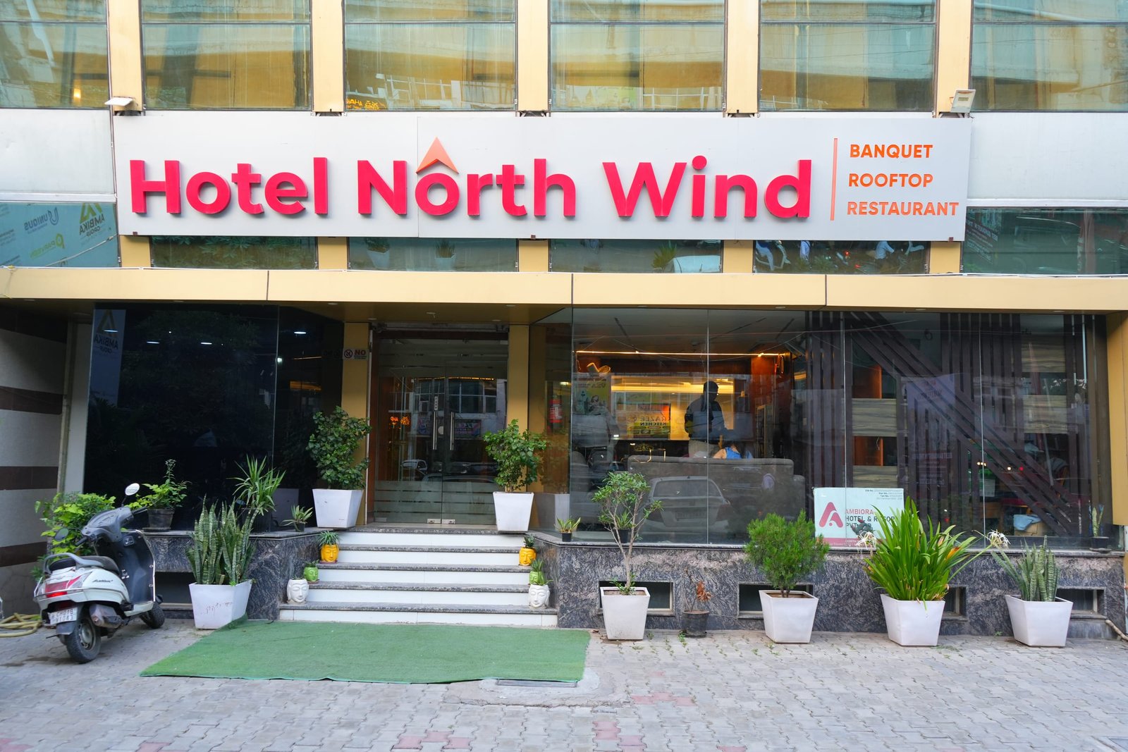 The lit entrance at Northwind after dark