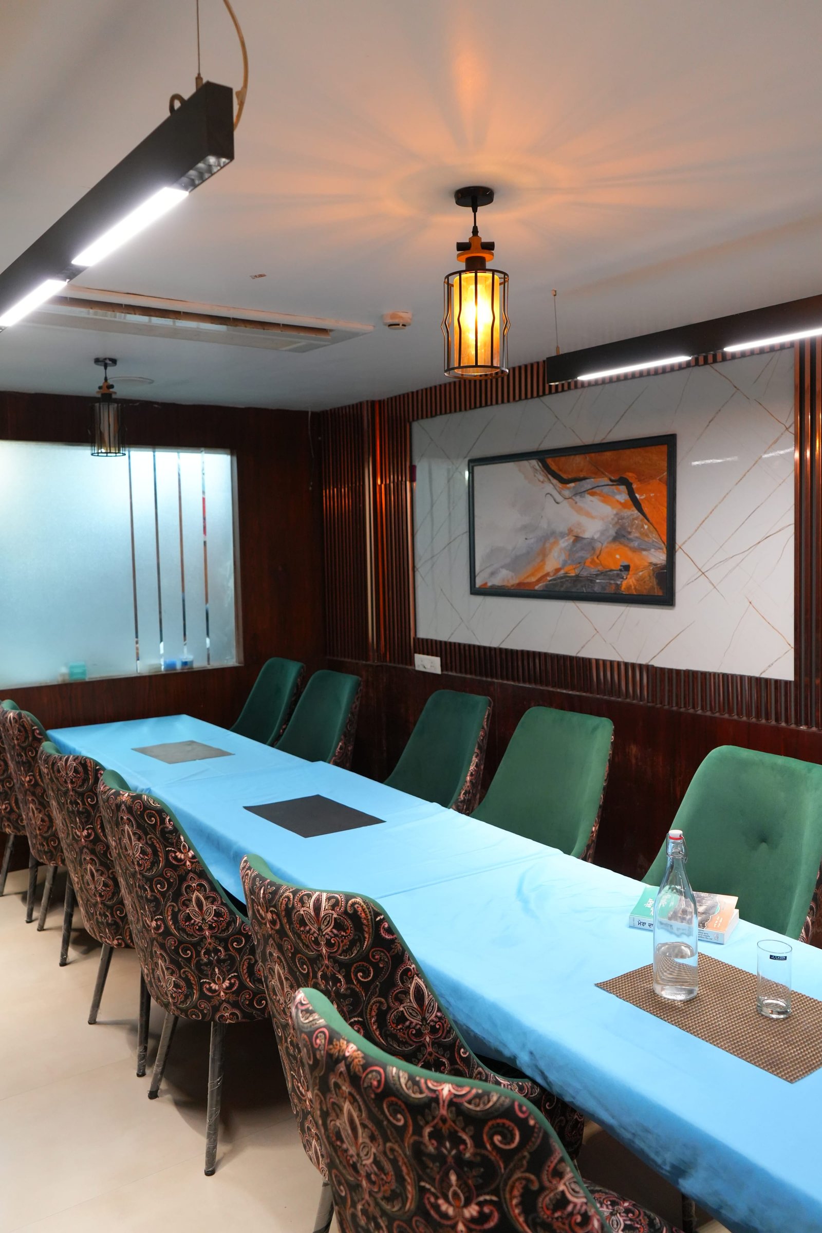 The hall set with a blue runner along the table