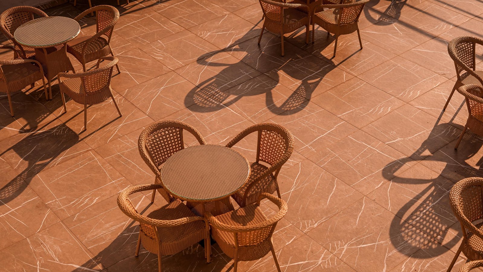 Tables and cane chairs across the roof